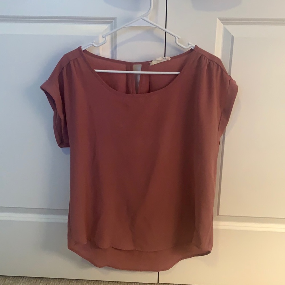 Large, dark pink professional tee